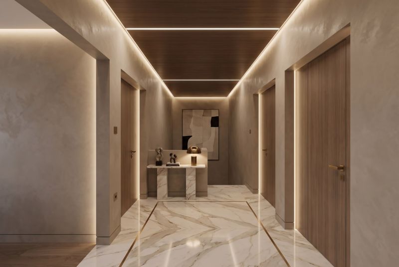 A hallway in a family house with a marble floor and a wooden ceiling.