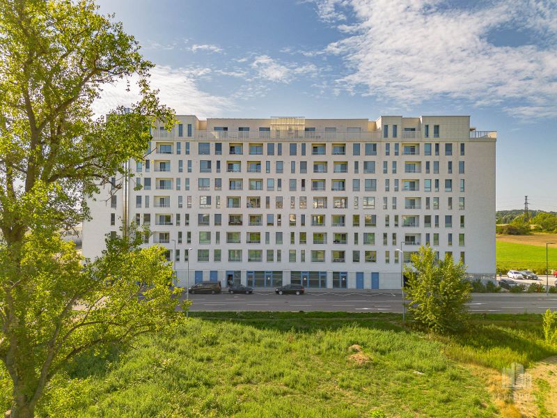 Apartment building on Labutia Street in Bratislava - Petržalka surrounded by greenery and nature.