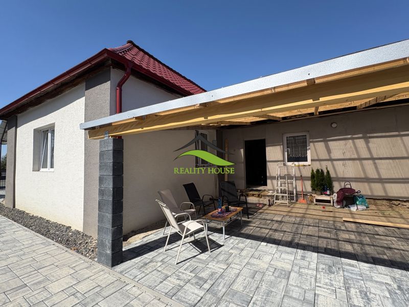 A family house on Hlavná Street in Bežovce with a spacious terrace and outdoor seating.