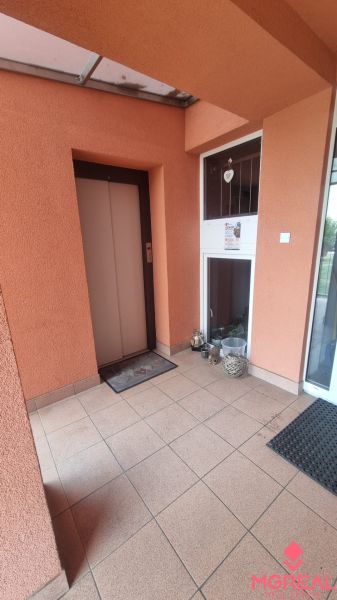 Entrance area with a lift and tiles in a 2-room apartment in Ivanka pri Nitre.