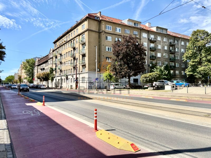 View of Vajanského nábrežie street in Bratislava - Old Town with buildings and a cycle path.