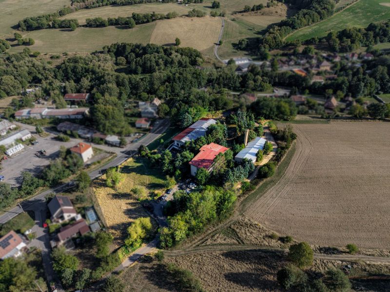 An aerial view of development plots in Slatinské Lazy surrounded by nature and fields.