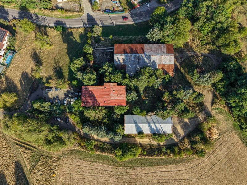 Aerial view of development plots with greenery in Slatinské Lazy.