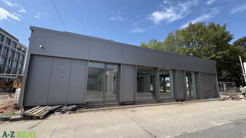 Commercial premises on Slovnaftská Street, Bratislava - Ružinov, with a modern facade and large windows.