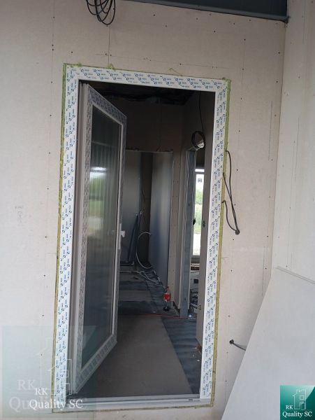 The interior of a family house with unfinished construction and electrical installation.