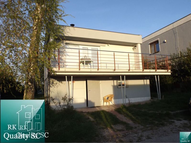 Family house at Sunny Lakes South in Senec with a spacious balcony and greenery.