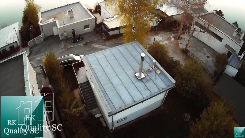Drone view of a cottage in Senec on SLNEČNÉ JAZERÁ JUH street, surrounded by greenery.