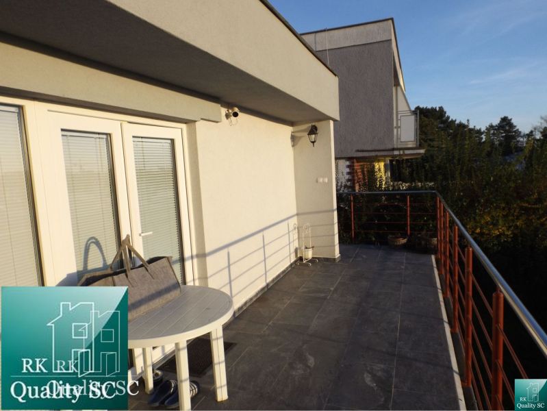 The balcony of the cottage at SUNNY LAKES SOUTH in Senec with a view of the surroundings.