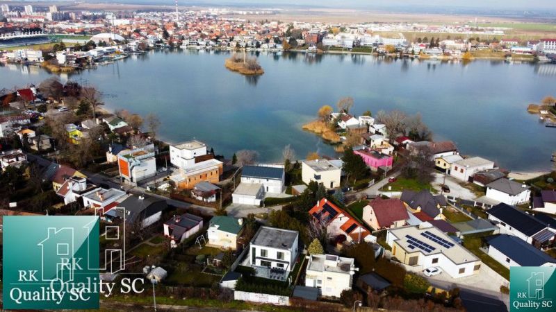 Aerial view of family houses near Sunny Lakes South in Senec.