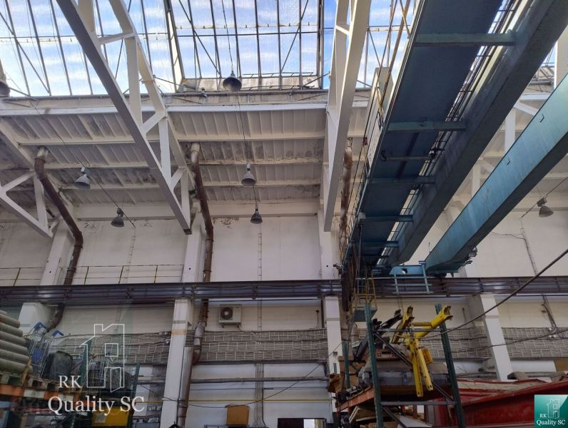 Interior of warehouses and halls with construction and lighting.