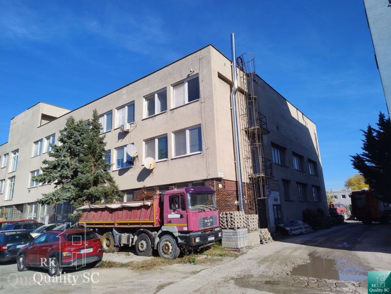Building and truck on Staviteľská Street in Bratislava III, in the Warehouses and Halls section.