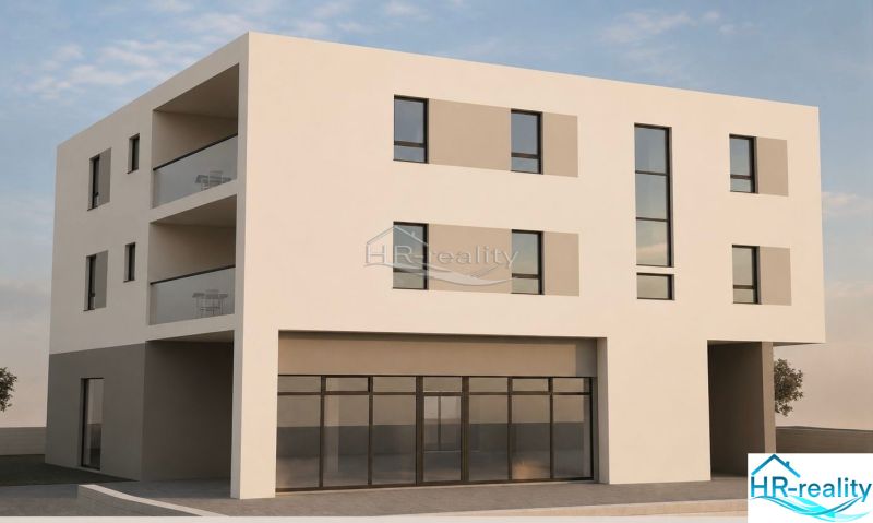 A recreational apartment in the city of Vodice with wide windows and a balcony with glass railings.