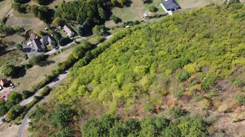 Aerial view of agricultural and forest lands in the village of Župkov.