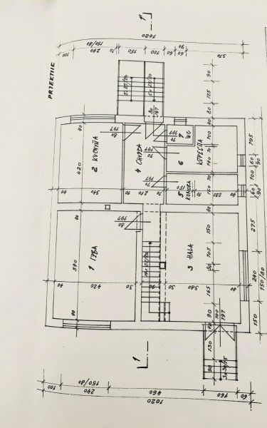 Floor plan of a family house with multiple rooms and dimensions, suitable for renovation.