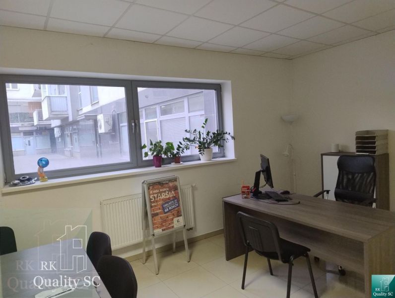 Offices with a desk, chairs, and plants on the windowsill in Senec.