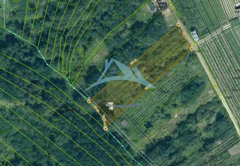 Aerial view of recreational plots in Veľký Krtíš with a marked parcel.