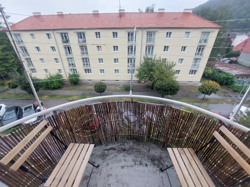 The balcony of a 2-room apartment on Rázus Street in Martin, Banská Bystrica, with a view of the street.