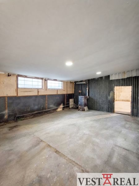 Industrial interior in warehouses and halls with concrete floors and light walls.