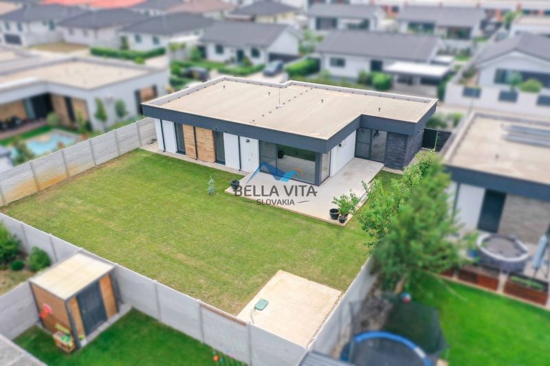 A family house on Milénium Street in Košúty with a spacious garden and terrace.