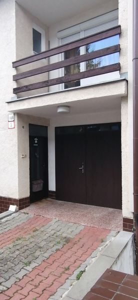 Family house on Astrova Street in Banská Bystrica with a garage and a balcony.