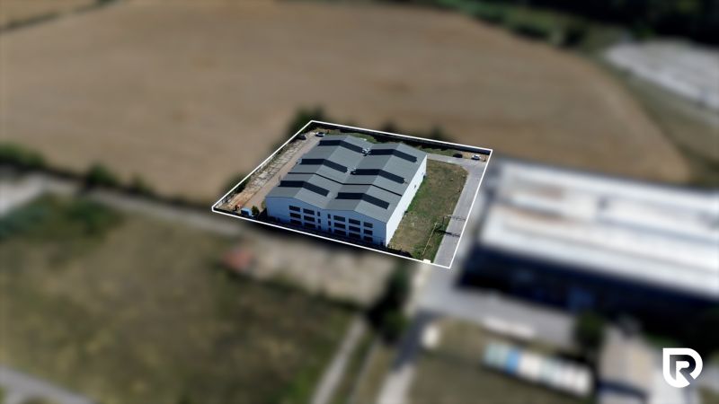 Warehouse and hall space in Trenčín on K výstavisku Street, surrounded by fields.