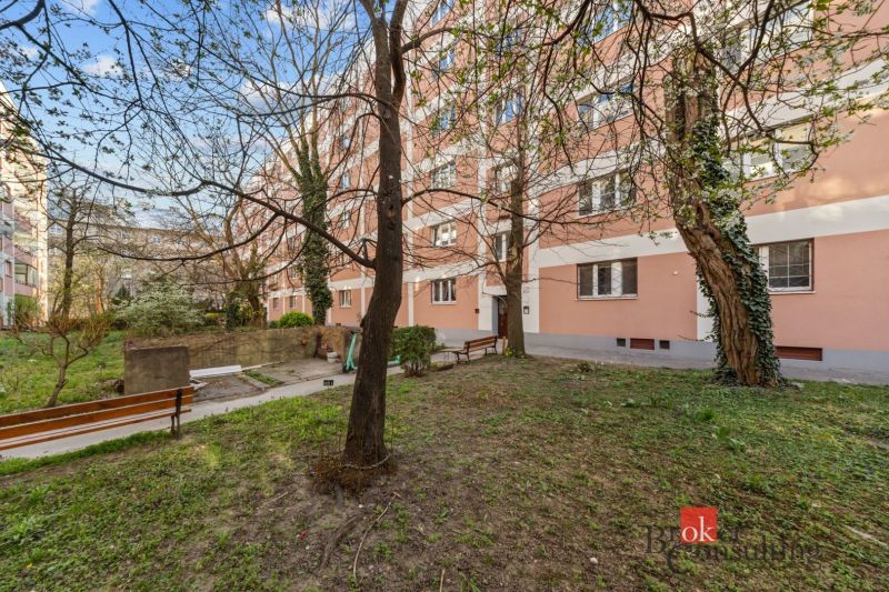 The exterior of the residential building on Šancová Street in Bratislava-Nové Mesto with landscaped park.