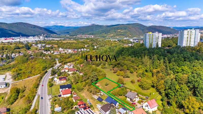 Aerial view of properties - housing on Sládkovičova in Považská Bystrica surrounded by greenery.