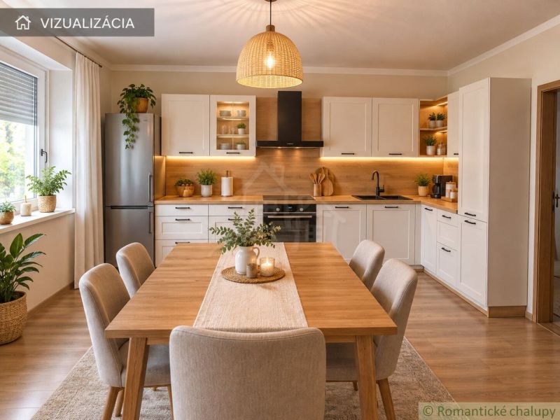A kitchen in a family house with wooden decor, plants, and pendant lighting.