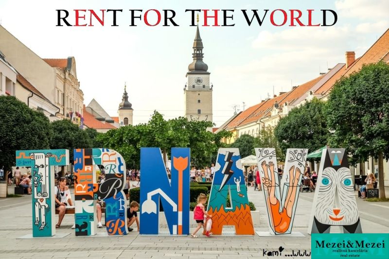 In Trnava, there are colorful signs and historical buildings, ideal for a 2-room apartment.