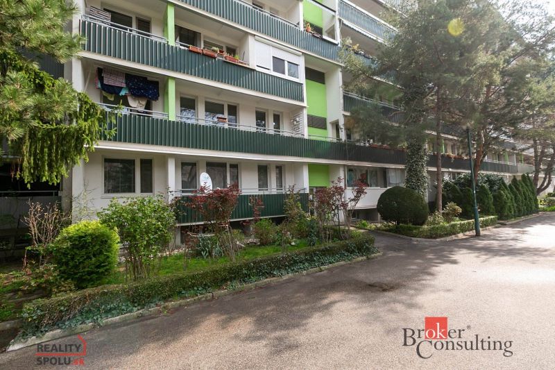 Apartment building on Donnerova Street in Bratislava-Karlova Ves with greenery in the surroundings.