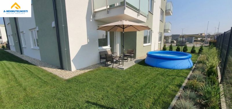 Exterior of a 3-room apartment on Šámot Street in Šamorín with a pool and terrace.
