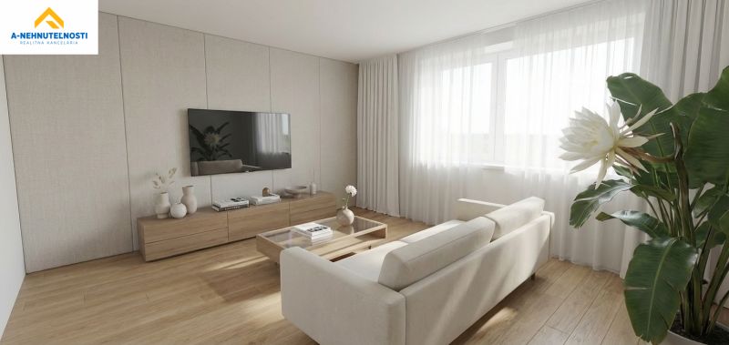 Living room with a comfortable sofa, television, and wooden decor flooring in a 3-room apartment.