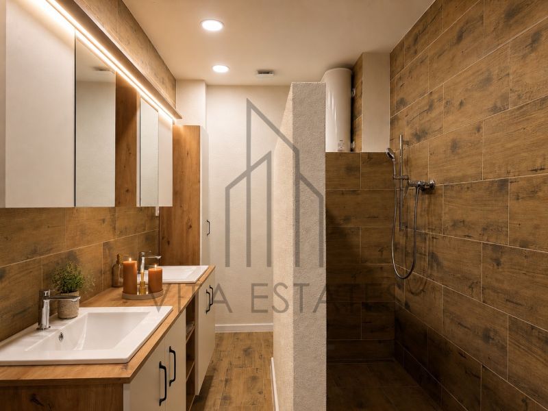 A bathroom with a wooden decor floor in a 3-room apartment.