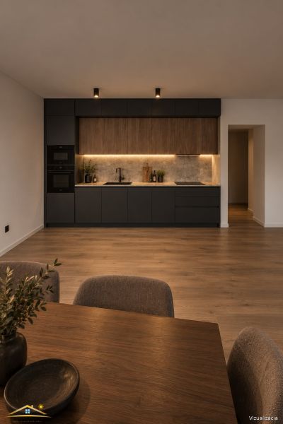 A stylish kitchen with black cabinets, wood-patterned flooring, and lighting in a 3-room apartment.