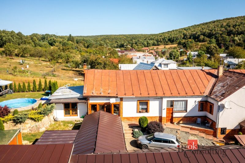 A family house in Potoky surrounded by nature with a pool in the garden.