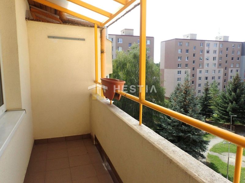 A balcony of a 3-room apartment with a view of the surroundings and panel buildings in Senica.