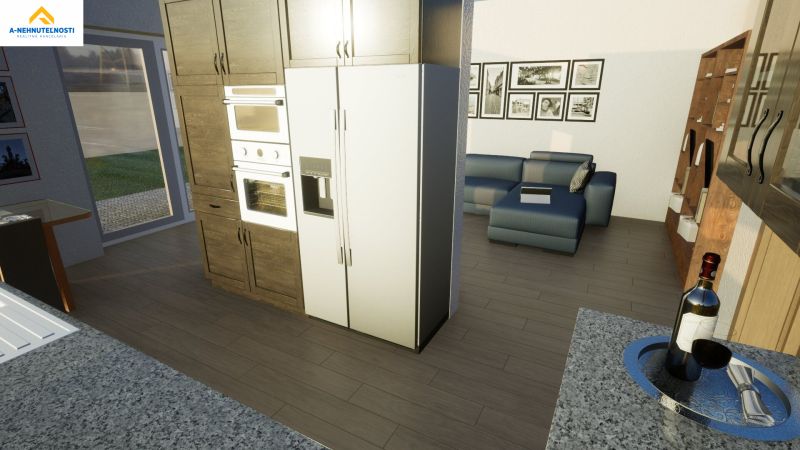 Interior of a family house with a kitchen unit, sofa, and floor with wooden decor.