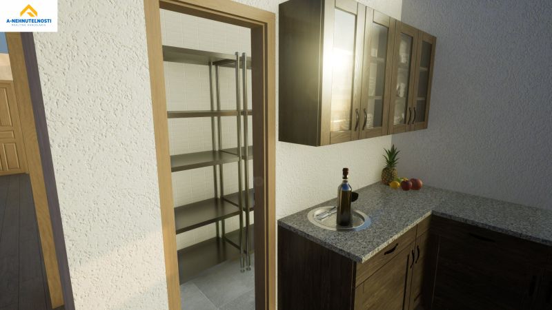 A kitchen in a family house with a pantry, wooden cabinets, fruit, and a granite countertop.