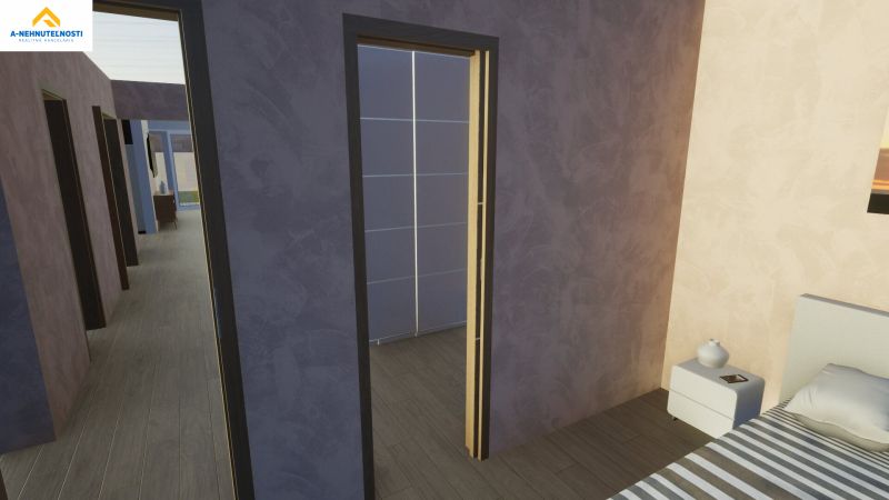 A bedroom in a family house with wall decoration and a wooden decor floor.