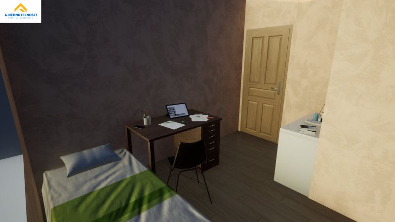 Bedroom in a family house with a desk and wooden decor flooring.