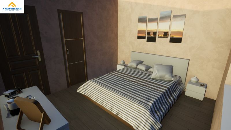 A bedroom in a family house with a striped bed and a wooden decor floor.