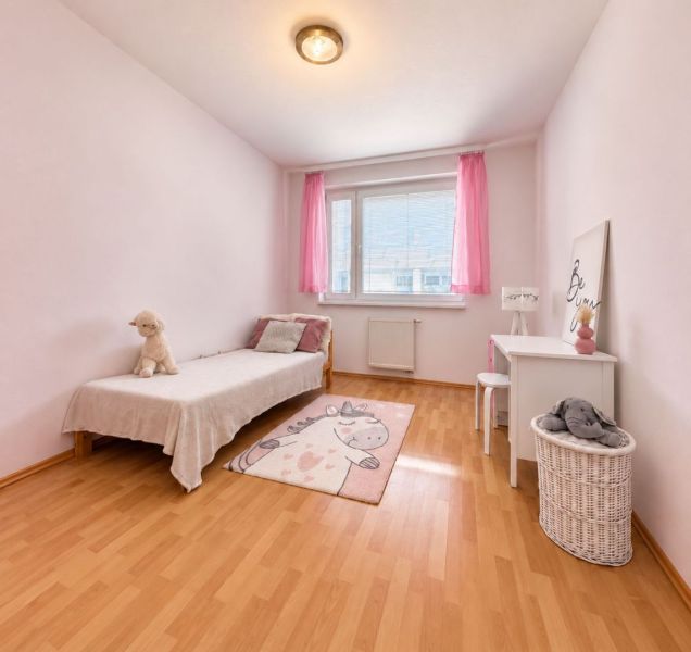 The balcony of a 3-room apartment in Bratislava - Ružinov with a view of the surrounding buildings.