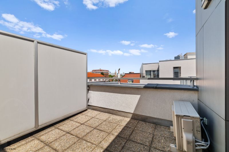 Rooftop terrace on Dunajská Street in Bratislava with a view from a three-room apartment.