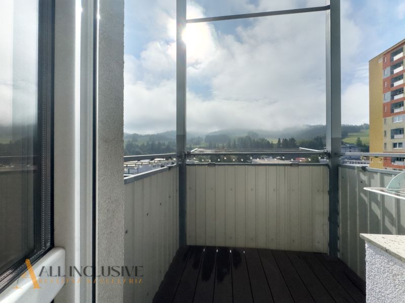 A balcony with a view of the mountains from a 2-room apartment in Nižná on Závodná Street.