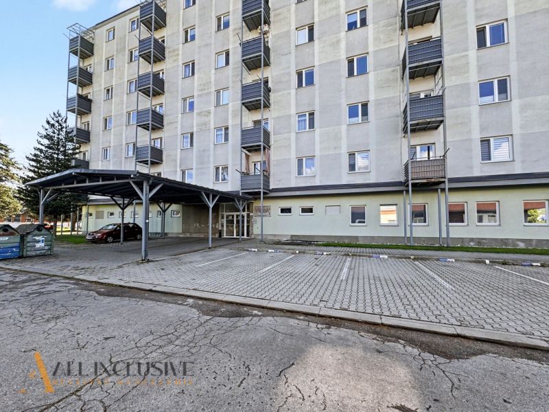 Apartment building on Závodná Street in Nižná with highlighted parking space.