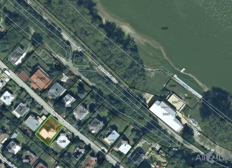 Aerial view of the Cottage on Rekreačná Street in Vrbové near the water body.