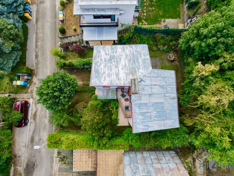 Aerial view of a cottage surrounded by greenery on Rekreačná Street in Vrbové.