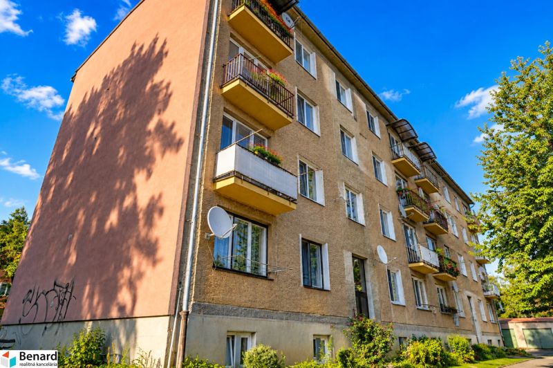 Apartment building on Fučíkova Street in Bardejov with four floors and balconies.