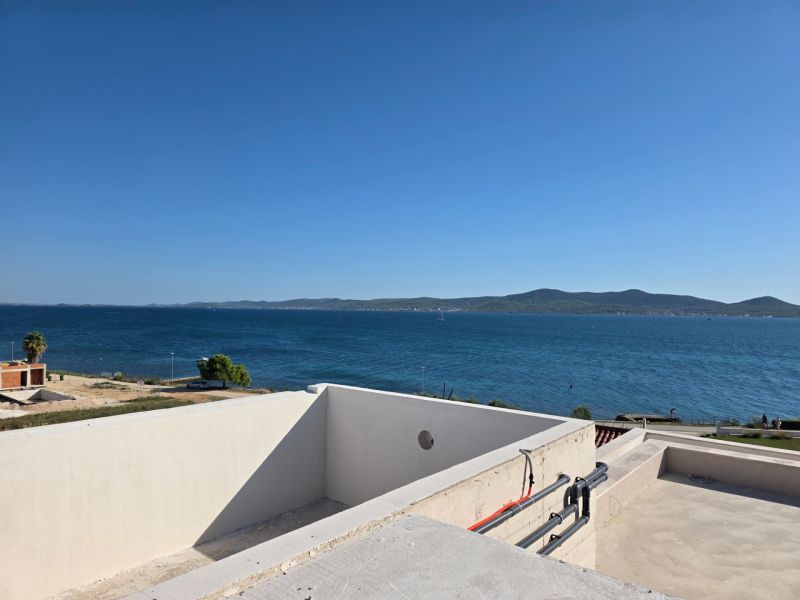 A view of the Adriatic Sea from the terrace of a 3-room apartment in Sukošan.