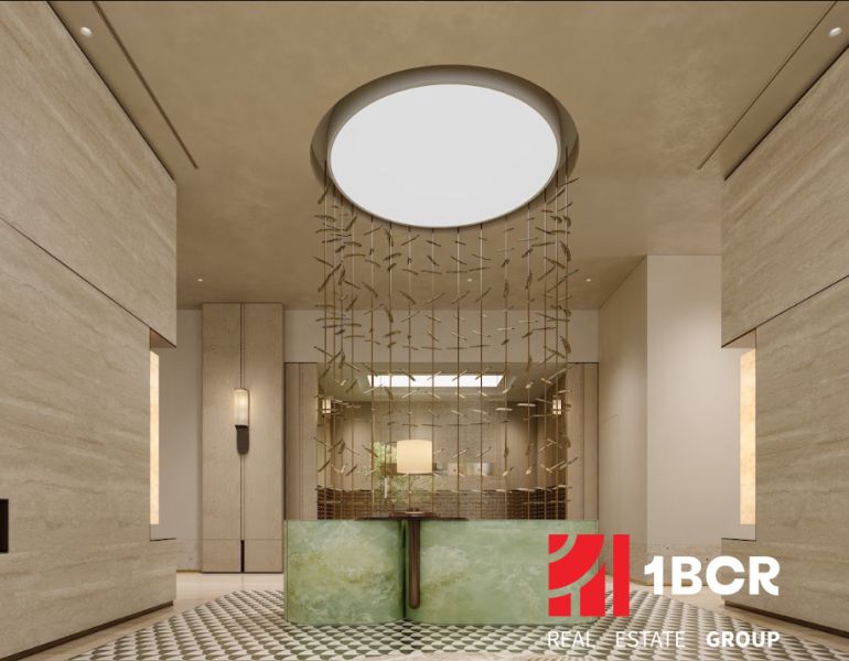 Reception in an apartment building with light decor and decorative curtains.